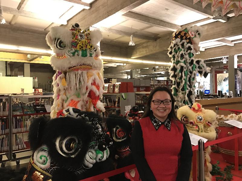 Deputy Representative of the Hong Kong Economic and Trade Office, Brussels, Miss Alice Choi, is pictured with some of the lion dance exhibits at the Legends of Lion Dance exhibition in Belgium on January 27.