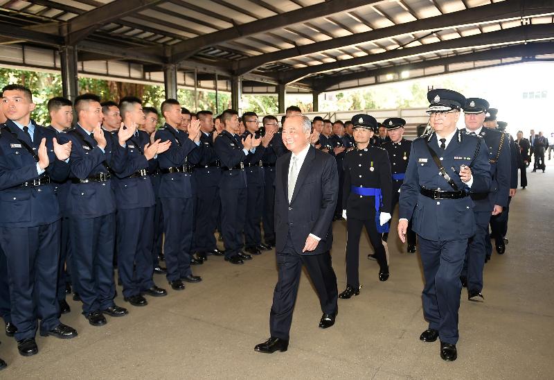 The Commissioner of Police, Mr Lo Wai-chung, and Non-Official Member of the Executive Council, Mr Chow Chung-kong, meet the graduates after the passing-out parade.
