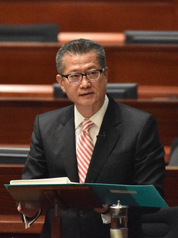 The Financial Secretary, Mr Paul Chan, presents the 2017-18 Budget in the Legislative Council today (February 22).