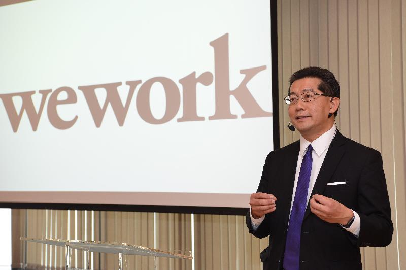 The Secretary for Commerce and Economic Development, Mr Gregory So, speaks at the opening ceremony of WeWork today (February 23).