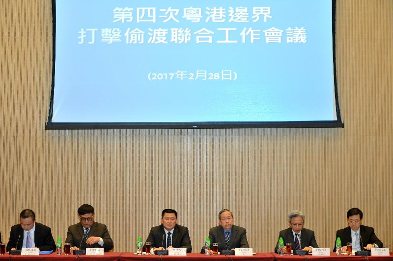 The Secretary for Security, Mr Lai Tung-kwok (third right), and the Director General of the Border Control Department of the Ministry of Public Security, Mr Chen Dingwu (third left), today (February 28) chaired the fourth meeting on combating the smuggling of illegal immigrants across the Hong Kong-Guangdong boundary in Hong Kong. Also attending the meeting were the Permanent Secretary for Security, Mr Joshua Law (second right); the Under Secretary for Security, Mr John Lee (first right); the Deputy Director General of the Hong Kong, Macao and Taiwan Affairs Office of the Ministry of Public Security, Mr Xu Qinggang (second left) and Associate Counsel of Bureau of Exit and Entry Administration of the Ministry of Pubic Security, Mr Xiang Yongjun (first left).