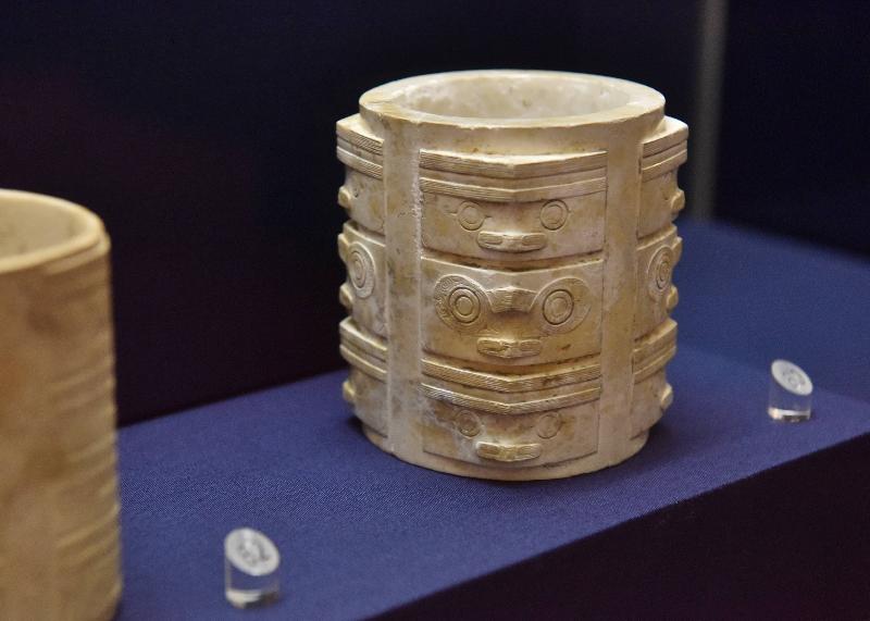 The opening ceremony of the exhibition entitled "The Legacy of Liangzhu Culture: Neolithic Relics from the Zhejiang Provincial Museum" was held at the Flagstaff House Museum of Tea Ware today (March 2). The exhibition is jointly organised by the Hong Kong Museum of Art and the Zhejiang Provincial Museum. Photo shows one of the exhibits, jade cong cube excavated from Fanshan, Yuhang county, Zhejiang province.