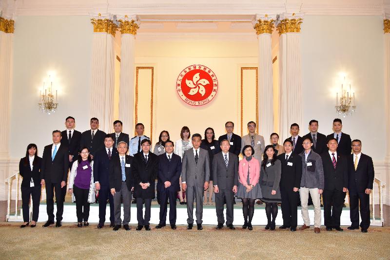 The Chief Executive, Mr C Y Leung, met with the staff involved in the rescue operation of the arson case in a MTR train compartment, which took place on February 10, at Government House this afternoon (March 8) to commend the professionalism they displayed during the incident. Photo shows Mr Leung (front row, centre); the Secretary for Food and Health, Dr Ko Wing-man (front row, sixth left); the Secretary for Transport and Housing, Professor Anthony Cheung Bing-leung (front row, seventh left); the Secretary for Security, Mr Lai Tung-kwok (front row, seventh right); and the Under Secretary for Food and Health, Professor Sophia Chan (front row, sixth right), with representatives from the Police Force, the Fire Services Department and the Hospital Authority.