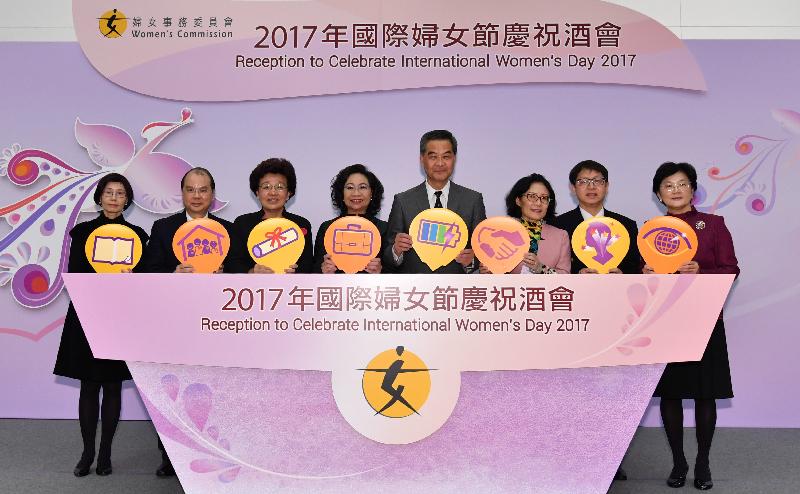 The Chief Executive, Mr C Y Leung, officiated at a reception organised by the Women's Commission to celebrate International Women's Day 2017 at Central Government Offices in Tamar today (March 8). Photo shows (from left) the Permanent Secretary for Labour and Welfare, Miss Annie Tam; the Chief Secretary for Administration, Mr Matthew Cheung Kin-chung; Deputy Director of the Liaison Office of the Central People's Government in the Hong Kong Special Administrative Region (HKSAR) Ms Yin Xiaojing; the wife of the Chief Executive, Mrs Regina Leung; Mr Leung; the Acting Commissioner of the Ministry of Foreign Affairs of the People's Republic of China in the HKSAR, Madame Tong Xiaoling; the Secretary for Labour and Welfare, Mr Stephen Sui; and the Chairperson of the Women's Commission, Mrs Stella Lau, officiating at the lighting ceremony.