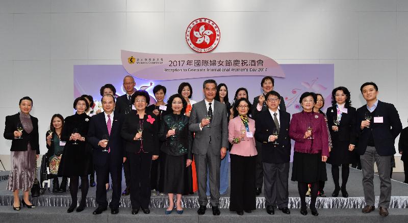The Chief Executive, Mr C Y Leung, officiated at a reception organised by the Women's Commission to celebrate International Women's Day 2017 at Central Government Offices in Tamar today (March 8). Photo shows (front row, from left) the Permanent Secretary for Labour and Welfare, Miss Annie Tam; the Chief Secretary for Administration, Mr Matthew Cheung Kin-chung; Deputy Director of the Liaison Office of the Central People's Government in the Hong Kong Special Administrative Region (HKSAR) Ms Yin Xiaojing; the wife of the Chief Executive, Mrs Regina Leung; Mr Leung; the Acting Commissioner of the Ministry of Foreign Affairs of the People's Republic of China in the HKSAR, Madame Tong Xiaoling; the Secretary for Labour and Welfare, Mr Stephen Sui; and the Chairperson of the Women's Commission, Mrs Stella Lau, proposing a toast with other guests.