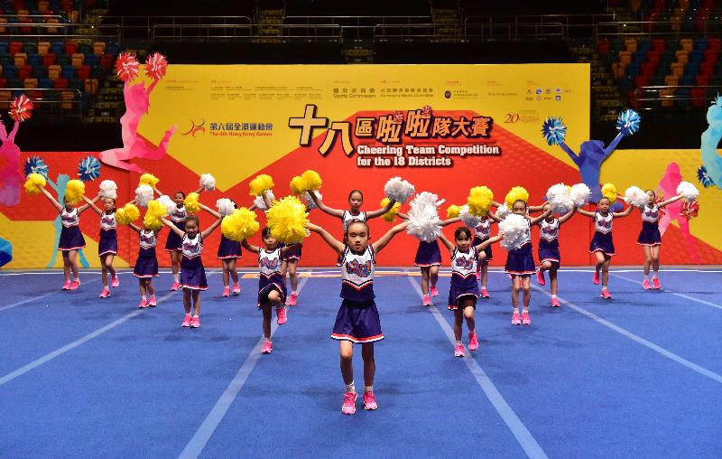 A cheering team performs with sophisticated dance moves and creative slogans to showcase the uniqueness and vitality of their district in the 6th Hong Kong Games Cheering Team Competition for the 18 Districts staged at Queen Elizabeth Stadium today (March 19).