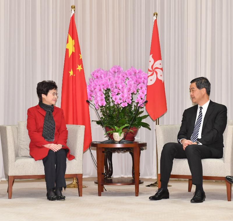 The Chief Executive, Mr C Y Leung (right), meets with the Chief Executive-elect, Mrs Carrie Lam (left), at the Chief Executive's Office this morning (March 27).