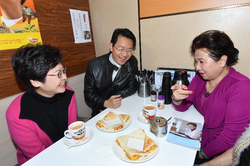 The Chief Executive-elect, Mrs Carrie Lam (left), visits a restaurant in Lok Fu this morning (March 28) to meet the public and listen to their views.