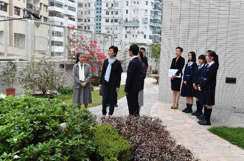 The Chief Executive-elect, Mrs Carrie Lam, visited her alma mater St Francis' Canossian College this morning (March 30). Photo shows Mrs Lam (second left) touring a garden which was built with her donations.