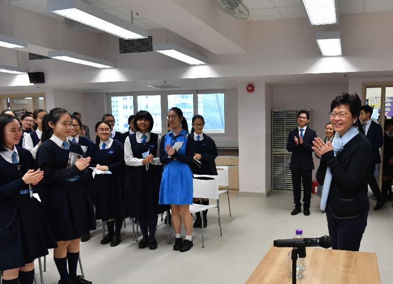 The Chief Executive-elect, Mrs Carrie Lam, visited her alma mater St Francis' Canossian College this morning (March 30). Photo shows Mrs Lam (first right) meeting students.