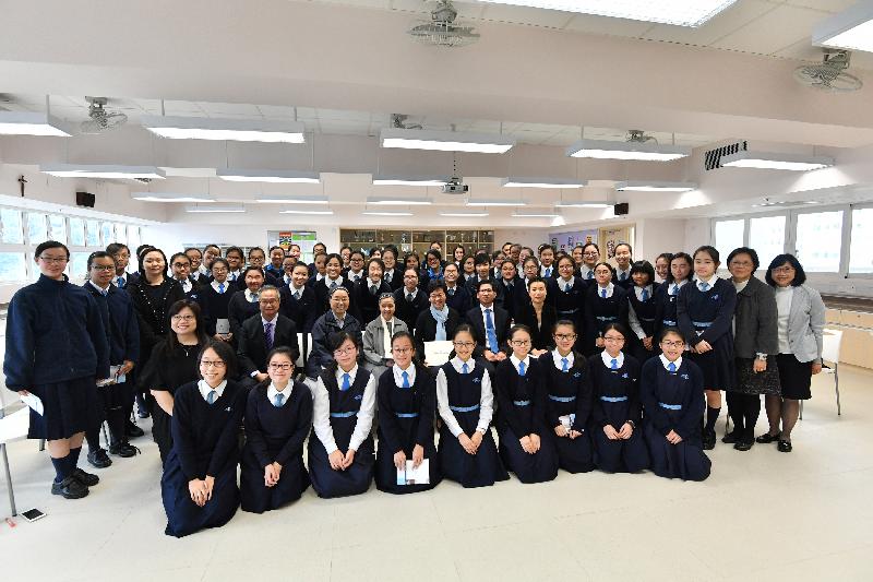 The Chief Executive-elect, Mrs Carrie Lam, visited her alma mater St Francis' Canossian College this morning (March 30). Photo shows Mrs Lam (second row, fifth left) with the Principal, Mr Kenneth Law (second row, sixth left); former principal Sister Marie Remedios (second row, fourth left); and teachers and students.
