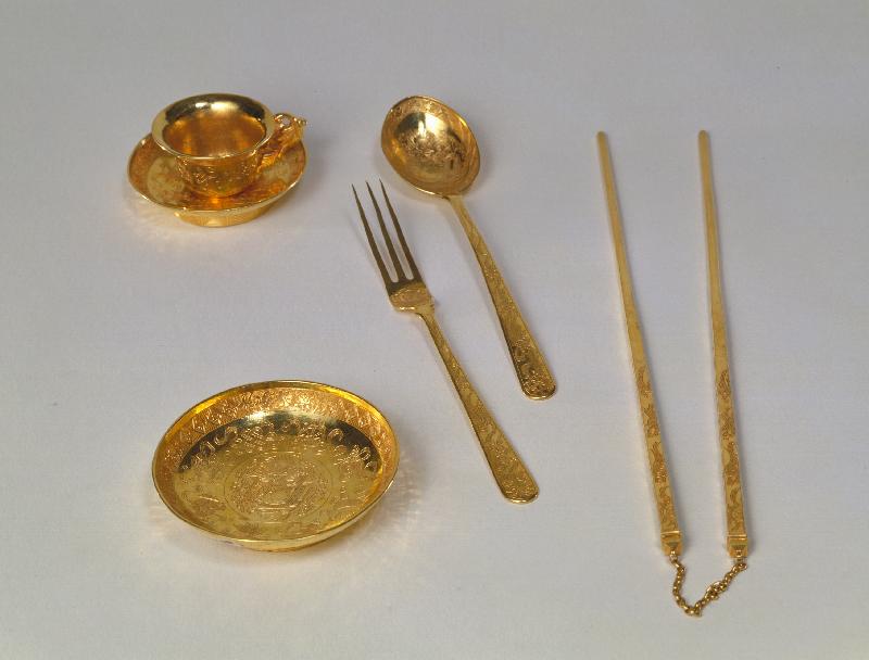 The Leisure and Cultural Services Department will hold two talks entitled "Life in the Palace" and "Kids Corner in the Palace" in late April, to be given by speakers from the Palace Museum. Photo shows palace eating utensils including a gold plate embossed with a design of eight treasures and dragon.