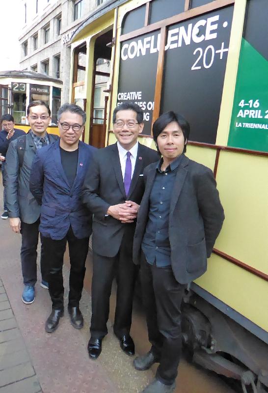 The Secretary for Commerce and Economic Development, Mr Gregory So (second right), yesterday (April 4, Milan time) toured the "Confluence‧20+ Creative Ecologies of Hong Kong" exhibition at the Milan Design Week 2017 and took a poetic tram ride presented by a young local design talent. He was accompanied by Chairman of the Board of Directors of Hong Kong Design Centre, Professor Eric Yim (second left); the Executive Director of Hong Kong Design Centre, Dr Edmund Lee (first left); and the young local design talent Kingsley Ng (first right).
