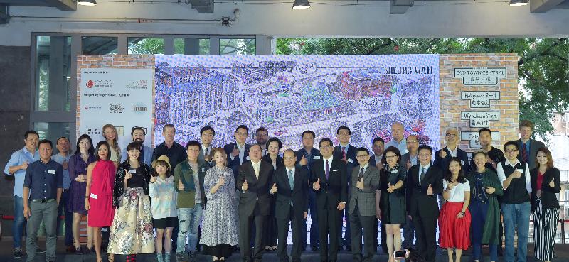 The Chief Secretary for Administration, Mr Matthew Cheung Kin-chung, attended the "Old Town Central" Launch Ceremony held at PMQ, Central today (April 26). Photo shows Mr Cheung (front row, ninth right); the Secretary for Commerce and Economic Development, Mr Gregory So (front row, eighth right); the Chairman of the Hong Kong Tourism Board, Dr Peter Lam (front row, tenth right), and other guests at the ceremony.