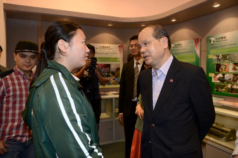 The Chief Secretary for Administration, Mr Matthew Cheung Kin-chung, is interviewed by a student reporter at the Ebenezer School and Home for the Visually Impaired 120th anniversary cum Munsang crossover Ebenezer talent show today (April 29).