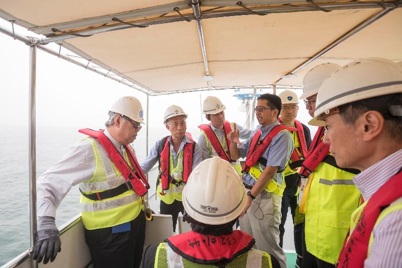 The Legislative Council Subcommittee to Follow Up Issues Relating to the Three-runway System (3RS) at the Hong Kong International Airport takes a boat trip to observe the 3RS reclamation works area today (May 5).