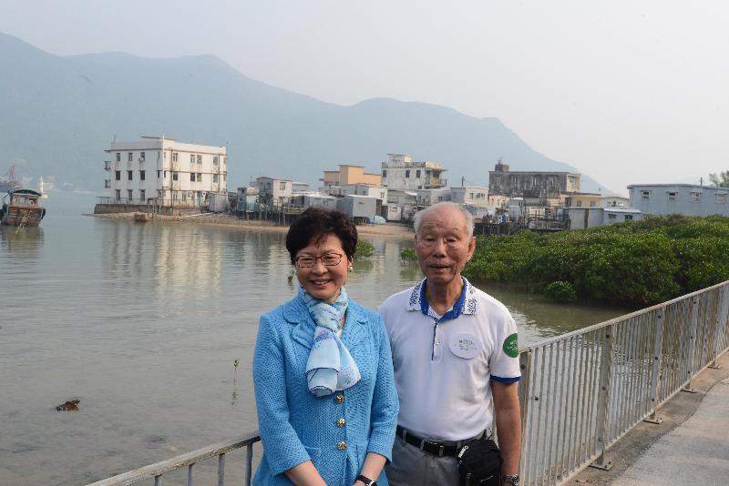 The Chief Executive-elect, Mrs Carrie Lam (left), is pictured with the Chairman of the Tai O Rural Committee, Mr Lou Cheuk-wing (right), today (May 5) in Tai O.