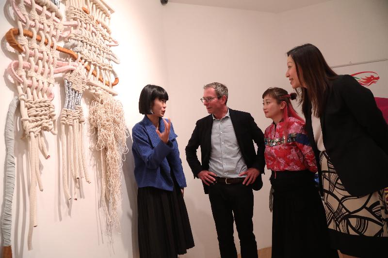 At the launch reception for the Fashion Farm Foundation: Emerging Hong Kong Designer Makers at London Craft Week, the Director-General of the Hong Kong Economic and Trade Office, London, Ms Priscilla To (right), discusses the exhibition with (from left) designer Zoe; the Chairman of London Craft Week, Mr Guy Salter; and the Chairwoman of Fashion Farm Foundation, Ms Edith Law, on May 3 (London Time).