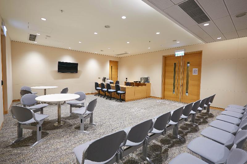The Chief Justice of the Court of Final Appeal, Mr Geoffrey Ma Tao-li, officiated at the opening ceremony of the West Kowloon Law Courts Building today (May 12). Picture shows the Small Claims Tribunal registration room.