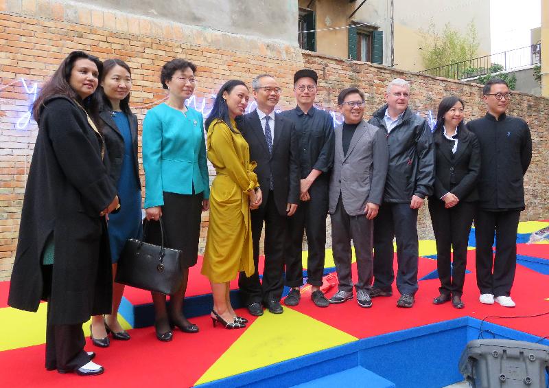 The Secretary for Home Affairs, Mr Lau Kong-wah (fifth left), in a group photo with the Minister Counselor of the Embassy of the People's Republic of China in Italy, Ms Zheng Xuan (third left); the Chairman of the Hong Kong Arts Development Council, Dr Wilfred Wong (fourth right); the Chief Executive Officer of the West Kowloon Cultural District Authority, Mr Duncan Pescod (third right); and Hong Kong artist Samson Young (fifth right) at the Hong Kong Pavilion at the Venice Biennale yesterday (May 11, Venice time).