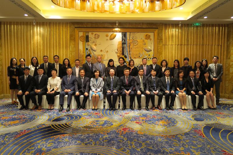 The Secretary for Financial Services and the Treasury, Professor K C Chan, and the Director-General of the Shanghai Municipal Government Financial Services Office, Mr Zheng Yang, held the seventh Working Meeting of Hong Kong-Shanghai Financial Co-operation in Shanghai today (May 23). Photo shows Professor Chan (first row, eighth left) and Mr Zheng (first row, seventh left) with representatives of government bodies, financial regulators and exchanges of the two places before the meeting. Hong Kong representatives include the Deputy Secretary for Financial Services and the Treasury (Financial Services), Ms Mable Chan (first row, sixth left), and others from the Hong Kong Monetary Authority, the Securities and Futures Commission, the Office of the Commissioner of Insurance and the Hong Kong Exchanges and Clearing Limited.