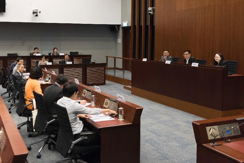Members of the Legislative Council (LegCo) and Central and Western District Council exchange views on issues of public concern at the Legislative Council Complex today (May 26).