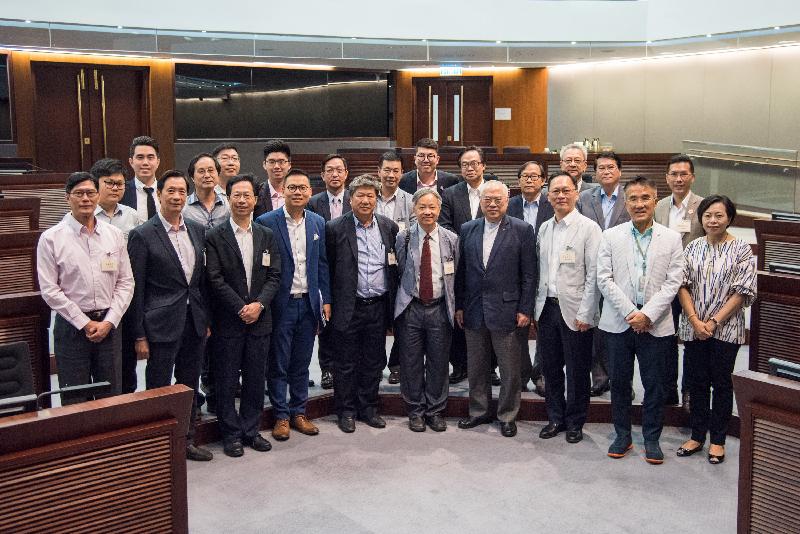 Members of the Legislative Council (LegCo) are pictured with members of Tuen Mun District Council after a meeting held at the LegCo Complex today (May 29).