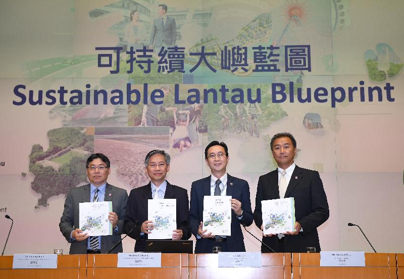 The Secretary for Development, Mr Eric Ma (second right), holds the Sustainable Lantau Blueprint Press Conference today (June 3). The Permanent Secretary for Development (Works), Mr Hon Chi-keung (second left); the Director of Civil Engineering and Development, Mr Lam Sai-hung (first left); and the Director of Planning, Mr Raymond Lee (first right), are also present.