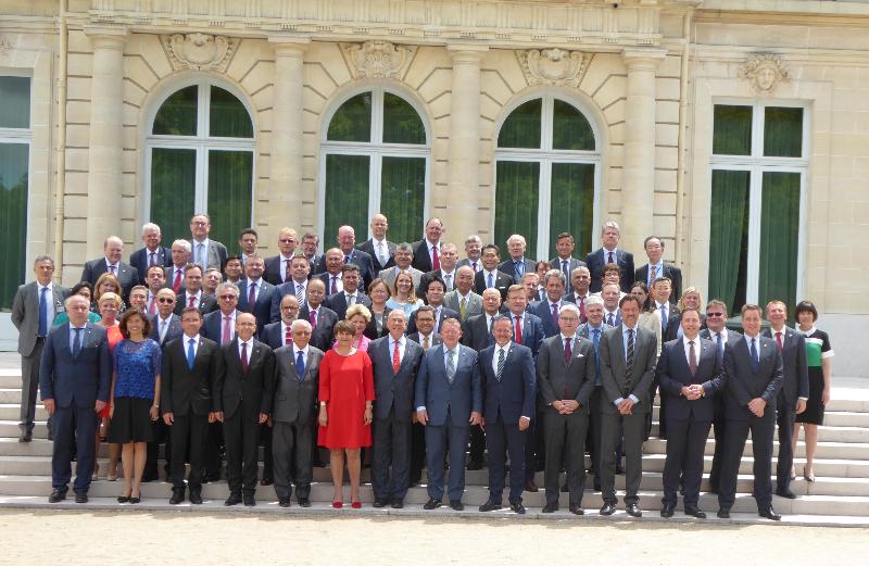 The Secretary for Commerce and Economic Development, Mr Gregory So (fifth row, fourth right), is pictured with other trade ministers in Paris, France, today (June 7, Paris time) ahead of the Organisation for Economic Co-operation and Development Ministerial Council Meeting's Trade and Investment Session entitled "International Trade and Investment for the Benefit of All". Mr So will join the participating ministers to discuss the importance of open markets and how the international rules on trade and investment can promote global economic growth and productivity at the session tomorrow (June 8, Paris time).