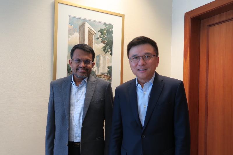 The Secretary for Financial Services and the Treasury, Professor K C Chan (right), began his duty visit to Singapore today (June 8) by meeting the Managing Director of the Monetary Authority of Singapore, Mr Ravi Menon, to discuss the latest financial developments in the two places.