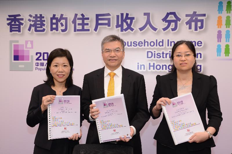 The Commissioner for Census and Statistics, Mr Leslie Tang (centre), presents the "Thematic Report on Household Income Distribution in Hong Kong" at a press conference today (June 9). Also present are the Assistant Commissioner for Census and Statistics, Ms Iris Law (left), and Senior Statistician Miss Jennifer Wong.
