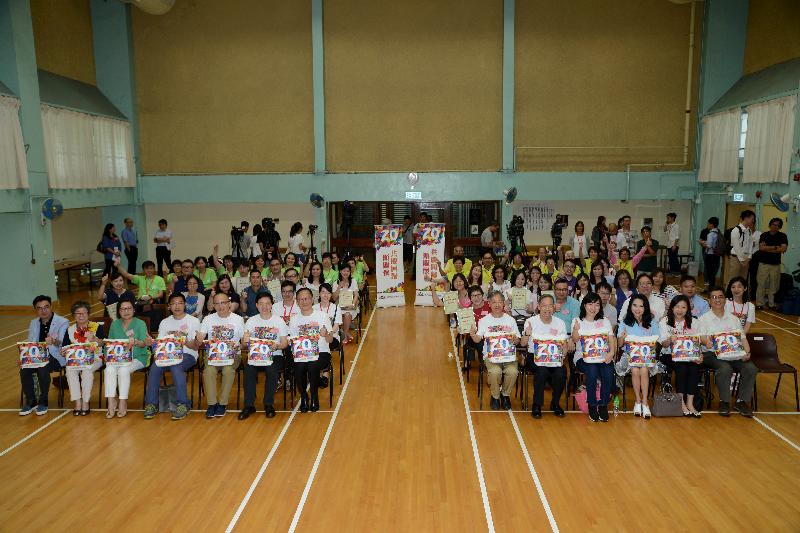 The Secretary for Security, Mr Lai Tung-kwok (first row, fifth right), visited elderly households and families in need in Tuen Mun under the "Celebrations for All" project today (June 12). Other participating guests include the Under Secretary for Security, Mr John Lee (first row, sixth left); the District Officer (Tuen Mun), Ms Aubrey Fung (first row, fourth right); the District Social Welfare Officer (Tuen Mun), Mr Tan Tick-yee (first row, fifth left); the Chairman of the Tuen Mun District Council, Mr Leung Kin-man (first row, sixth right); the Vice Chairman of the Tuen Mun District Council, Mr Lothar Lee (first row, seventh left); and the Vice Chairman of the Social Services Committee of the Tuen Mun District Council, Mr Tsang Hin-hong (first row, fourth left).