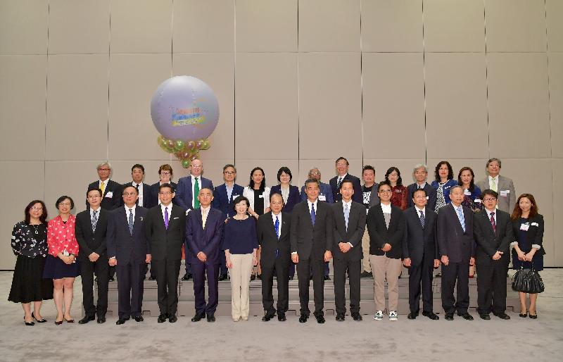The Chief Executive, Mr C Y Leung, held a welcoming reception this evening (June 15) for speakers, exhibitors and supporting organisations taking part in the Gerontech and Innovation Expo cum Summit. Mr Leung (front row, seventh right); the Chief Secretary for Administration, Mr Matthew Cheung Kin-chung (front row, centre); the Chairperson of the Hong Kong Council of Social Service, Mr Bernard Chan (front row, sixth right); and the Chairperson of the Board of Directors of the Hong Kong Science and Technology Parks Corporation, Mrs Fanny Law (front row, seventh left) are pictured with the representatives of supporting organisations.