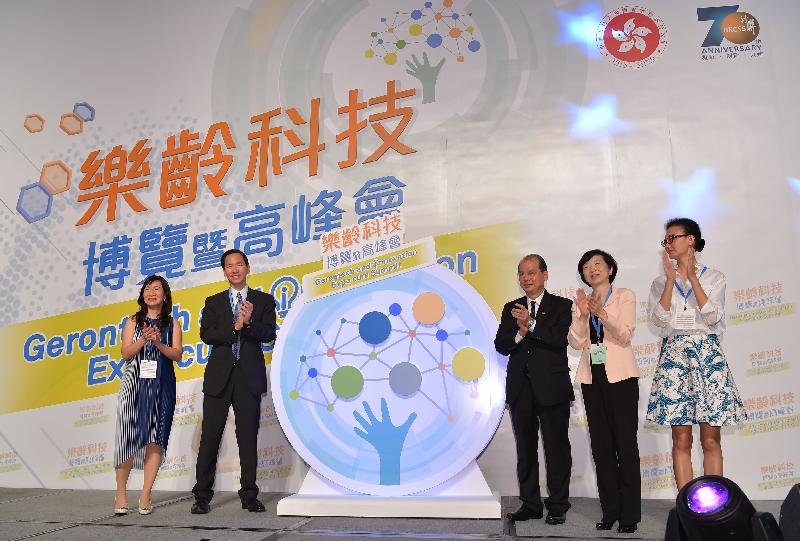 The Chief Secretary for Administration, Mr Matthew Cheung Kin-chung, this morning (June 16) attended the Opening Ceremony of the Gerontech and Innovation Expo cum Summit. Photo shows Mr Cheung (third right); the Chairperson of the Hong Kong Council of Social Service, Mr Bernard Chan (second left); the Chairperson of the Hong Kong Science and Technology Parks Corporation, Mrs Fanny Law (second right); and other guests officiating at the ceremony.