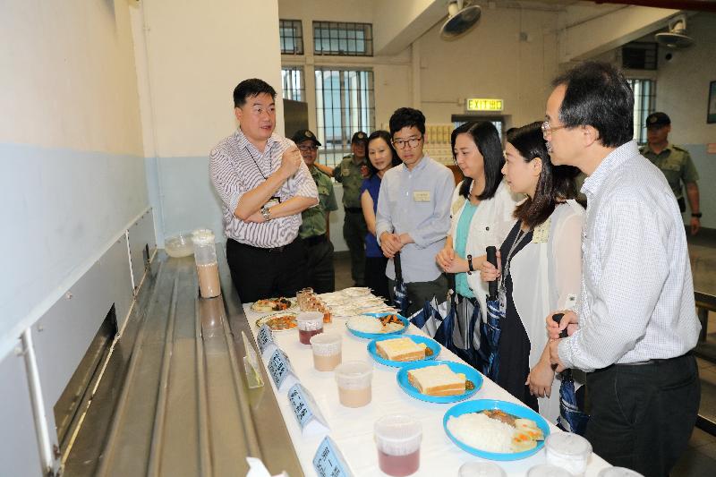 Members of the Legislative Council Subcommittee on Children's Rights learn about meal arrangements for the young inmates at Pik Uk Correctional Institution today (June 16).