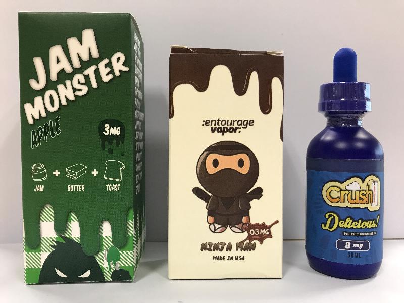 A 22-year-old man was arrested today (June 20) in a joint operation by the Department of Health and the Police in Wong Tai Sin for selling illegally three nicotine-containing liquids. Photo shows the products, "JAM MONSTER", "NINJA MAN" and "Crush FRUITS", which are intended for use with electronic nicotine delivery systems, commonly known as electronic cigarettes.