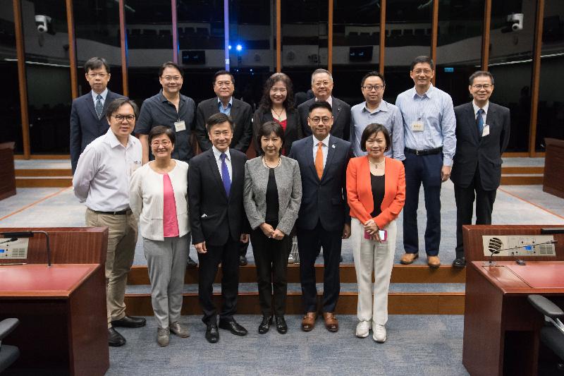 Members of the Legislative Council (LegCo) and Yau Tsim Mong District Council pictured after the meeting held at the LegCo Complex today (June 23).