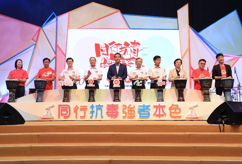 The Chief Executive, Mr C Y Leung (fifth left), today (June 24) officiates at the large-scale anti-drug event "Fight Drugs Together 2017". Other officiating guests include the Secretary for Security, Mr Lai Tung-kwok (fourth left); the Permanent Secretary for Security, Mr Joshua Law (fifth right); the Under Secretary for Security, Mr John Lee (third left); the Chairman of the Action Committee Against Narcotics (ACAN), Dr Ben Cheung (fourth right); the Chairman of the ACAN Sub-committee on Preventive Education and Publicity, Dr Tik Chi-yuen (second left); the Convenor of the Research Advisory Group, Professor Cheung Yuet-wah (third right); the Commissioner for Narcotics, Ms Manda Chan (first left); the Assistant Director of Broadcasting (Radio and Corporate Programming), Mr Albert Cheung (second right); and singer Hacken Lee (first right).