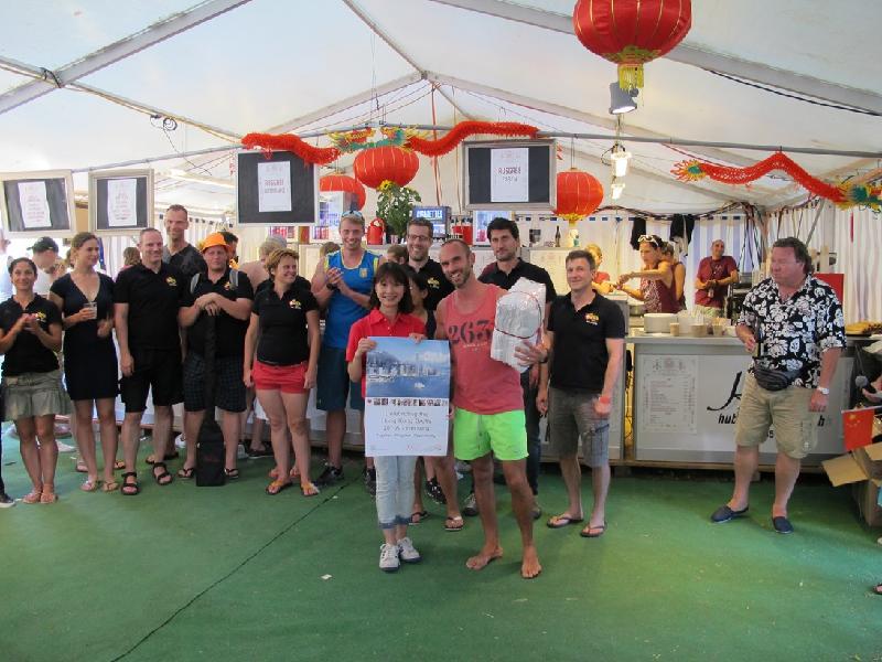 The 26th dragon boat races in Eglisau, Switzerland, were held on June 24 and 25 (Eglisau time). Photo shows the Deputy Director of the Hong Kong Economic and Trade Office, Berlin, Miss Alison Lo (front left), with one of the winning teams.