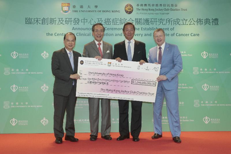 The Chief Secretary for Administration, Mr Matthew Cheung Kin-chung, attended the announcement ceremony for the establishment of the Centre for Clinical Innovation and Discovery and Institute of Cancer Care held at the University of Hong Kong today (June 28). Picture shows (from left) Mr Cheung; the Council Chairman of the University of Hong Kong, Professor Arthur Li; the Chairman of the Hong Kong Jockey Club, Dr Simon Ip; and the Chief Executive Officer of the Hong Kong Jockey Club, Mr Winfried Engelbrecht-Bresges, at the cheque presentation ceremony. 