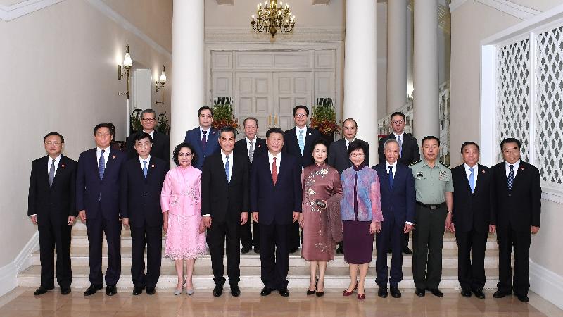 President Xi Jinping (front row, sixth left) and his wife Peng Liyuan (front row, sixth right) are pictured before dinner at Government House today (June 29) with the Chief Executive, Mr C Y Leung (front row, fifth left), and his wife Mrs Regina Leung (front row, fourth left); the Chief Executive-elect, Mrs Carrie Lam (front row, fifth right), and her husband Mr Lam Siu-por (front row, fourth right); and other attendees.