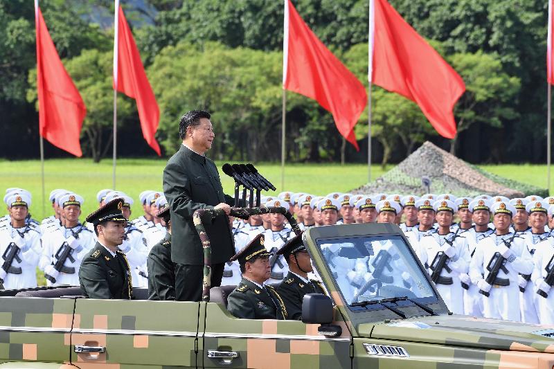 President Xi Jinping inspects troops of the People's Liberation Army Hong Kong Garrison by car at Shek Kong Barracks this morning (June 30).