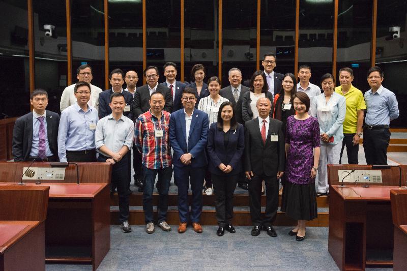Members of the Legislative Council (LegCo) and Sha Tin District Council pictured after the meeting held at the LegCo Complex today (June 30).