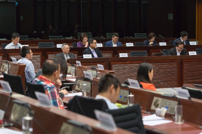 Members of the Legislative Council (LegCo) and Sha Tin District Council discuss issues relating to a serious shortage of parking spaces for goods vehicles and coaches in Sha Tin at a meeting at the LegCo Complex today (June 30).