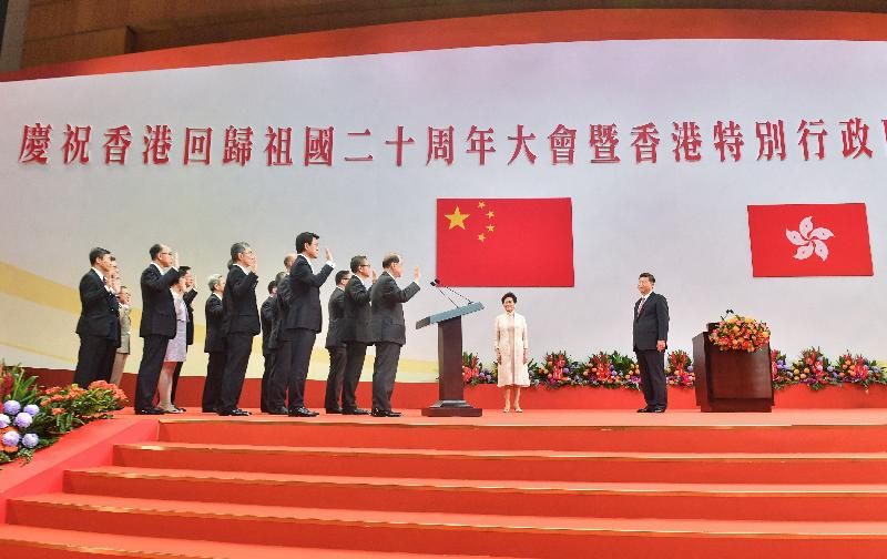 President Xi Jinping (first right) swears in the Principal Officials of the Fifth Term Hong Kong Special Administrative Region Government at the Inaugural Ceremony of the Fifth Term Government of the Hong Kong Special Administrative Region at the Hong Kong Convention and Exhibition Centre this morning (July 1). Looking on is the Chief Executive, Mrs Carrie Lam (second right).