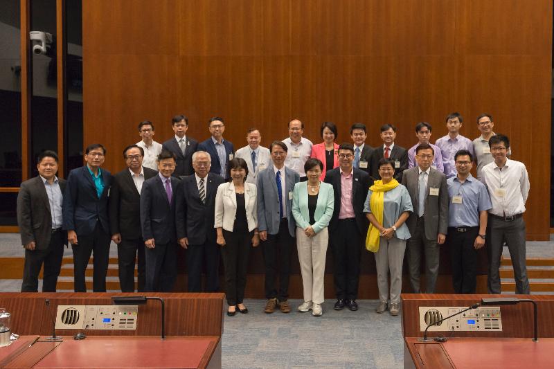 Members of the Legislative Council (LegCo) and the Kowloon City District Council pictured after a meeting held at the LegCo Complex today (July 7). 
