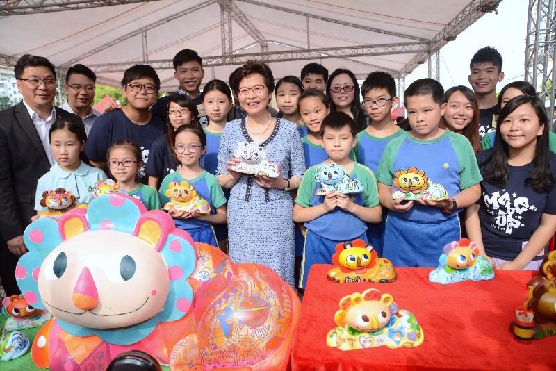 The Chief Executive, Mrs Carrie Lam, attended Celebrating the 20th Anniversary of the Establishment of the Hong Kong Special Administrative Region - Opening Carnival of the Wong Tai Sin Square today (July 10). Photo shows Mrs Lam (front row, centre) visiting a booth.