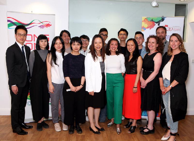 The Director-General of the Hong Kong Economic and Trade Office, London (London ETO), Ms Priscilla To (front row, centre), is pictured on July 6 (Manchester time) with artists of the installation "One of Two Stories, or Both (Field Bagatelles)" and the exhibition "From Ocean to Horizon" with organisers and staff from the Centre for Chinese Contemporary Art in Manchester. Both displays are supported by the London ETO to celebrate the 20th anniversary of the establishment of the Hong Kong Special Administrative Region.