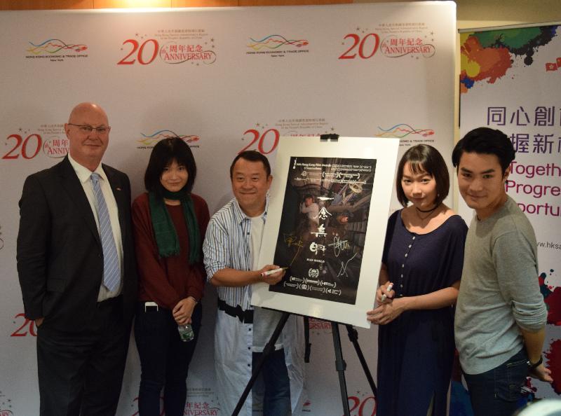 The Director of the Hong Kong Economic and Trade Office in New York, Mr Steve Barclay (first left); actor Eric Tsang (centre); director Wong Chun (first right); screenwriter Florence Chan (second right); and producer Heiward Mak (second left) attend the press conference for the Hong Kong Panorama programme at the New York Asian Film Festival on July 12 (New York time).
