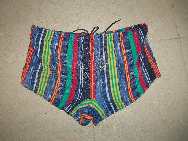 The deceased wore a pair of swimming trunks with multi-colour stripes.